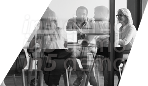 A group of people sitting around a table. Description generated by AI